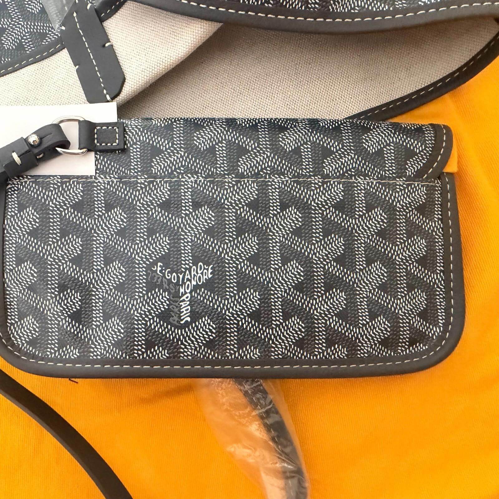 Goyard St. Louis bag GM- Goyardine interior showing pouch and strap detailing.