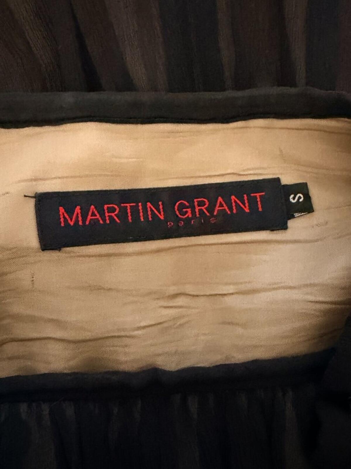MARTIN GRANT FRENCH SILK RAW HEM LAYERED CIRCLE SKIRT S label inside skirt, showcasing the designer's branding.