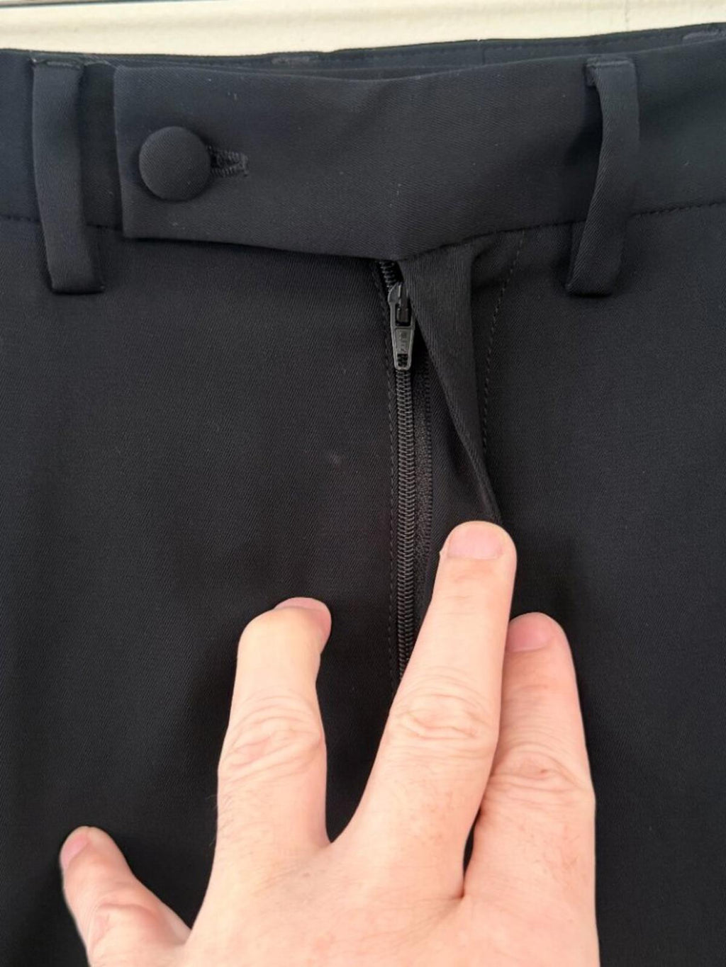 Close-up of TOM FORD BLACK DRESS SPECIAL OCCASION PANTS showing the fabric-covered button and discreet zip closure.