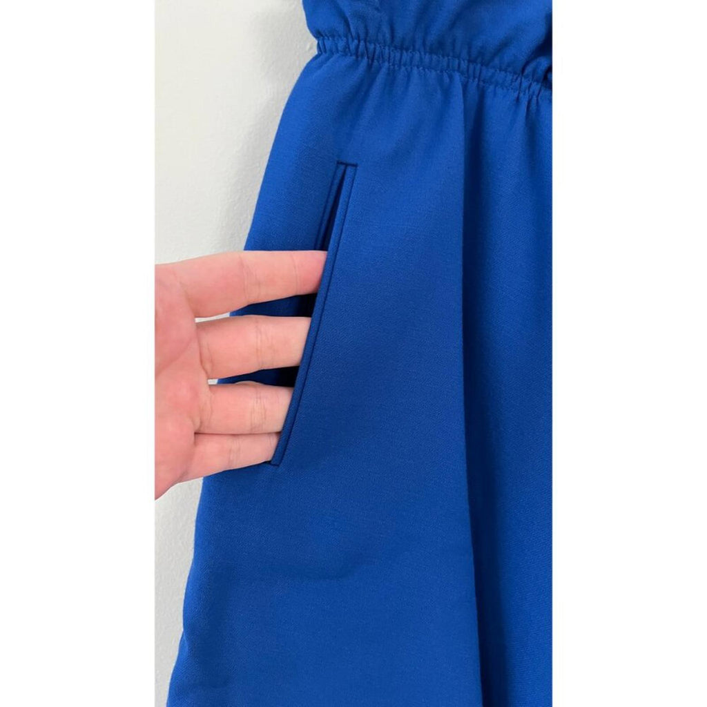 GIORGIO ARMANI BLACK LABEL BLUE LAYERED SKIRT showing a hand on the side pocket of the skirt.
