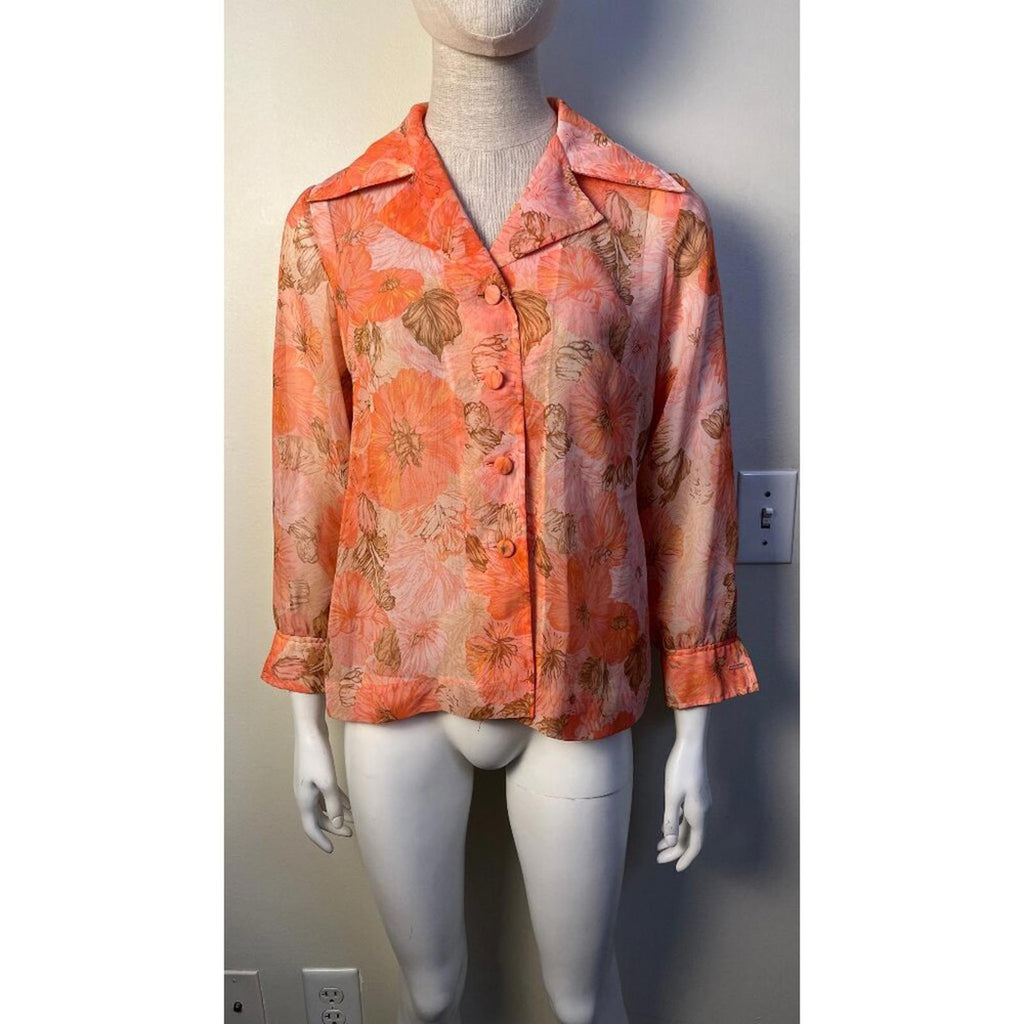 VINTAGE FLORAL 50'S 60'S SHEER JACKET displayed on a mannequin, featuring a floral design and cuffed sleeves.