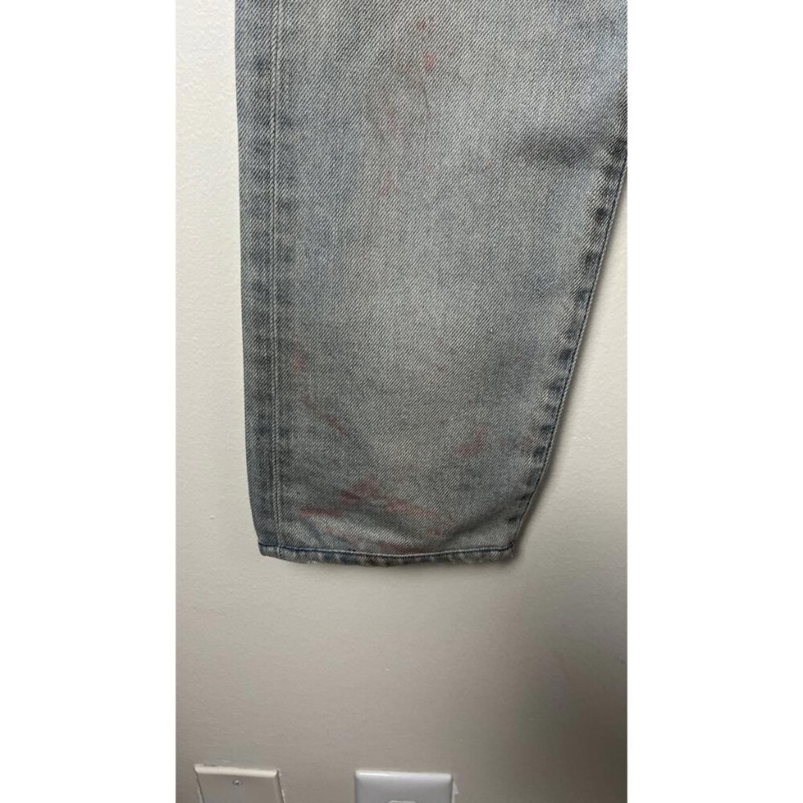JOHN ELLIOTT THE CAST 2 SPRING DIRTY JEANS showing factory staining and dirty markings on the leg.