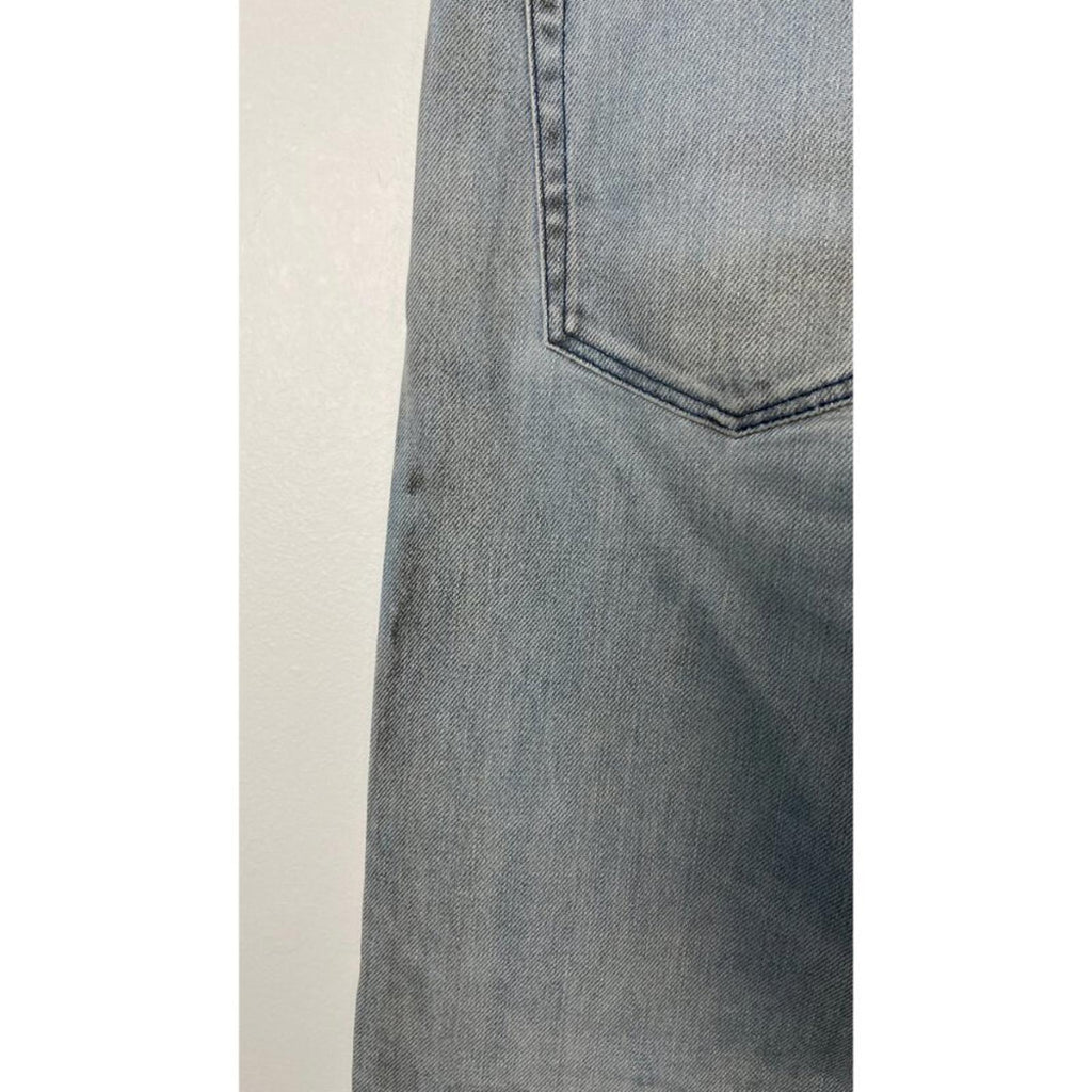 Close-up of JOHN ELLIOTT THE CAST 2 SPRING DIRTY JEANS showcasing factory staining and dirty markings.