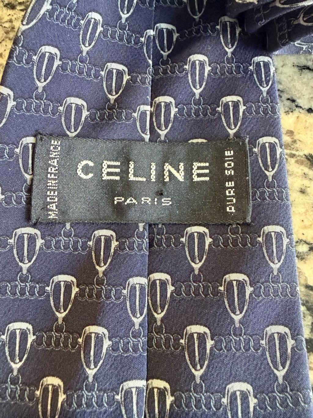 CELINE GEOMETRIC LOGO PRINT NECK TIE featuring the brand logo and geometric design on elegant fabric.