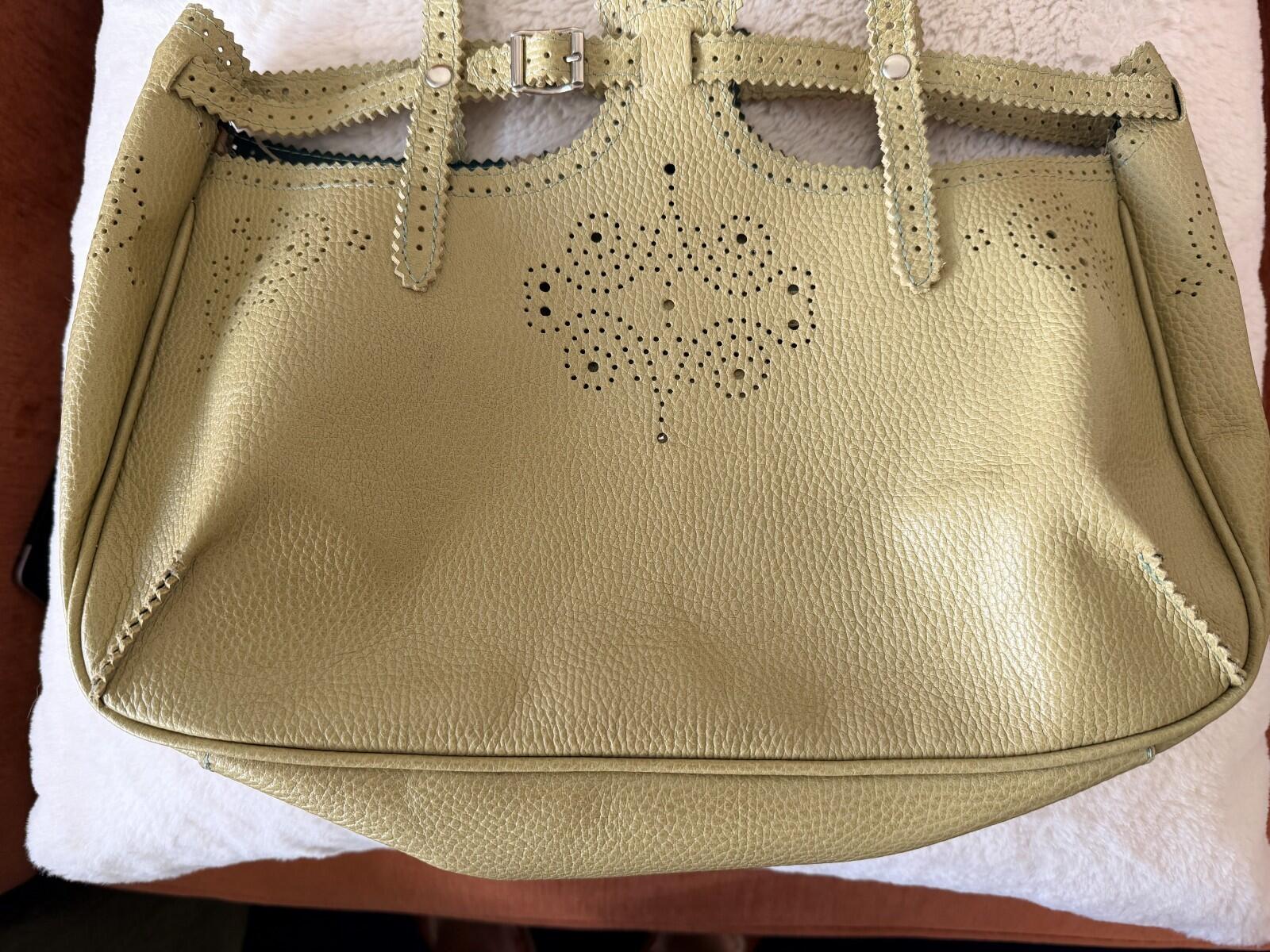 JAMIN PUECH DELICATE DETAIL HANDBAG with lace perforated detail and soft leather in vibrant chartreuse color.