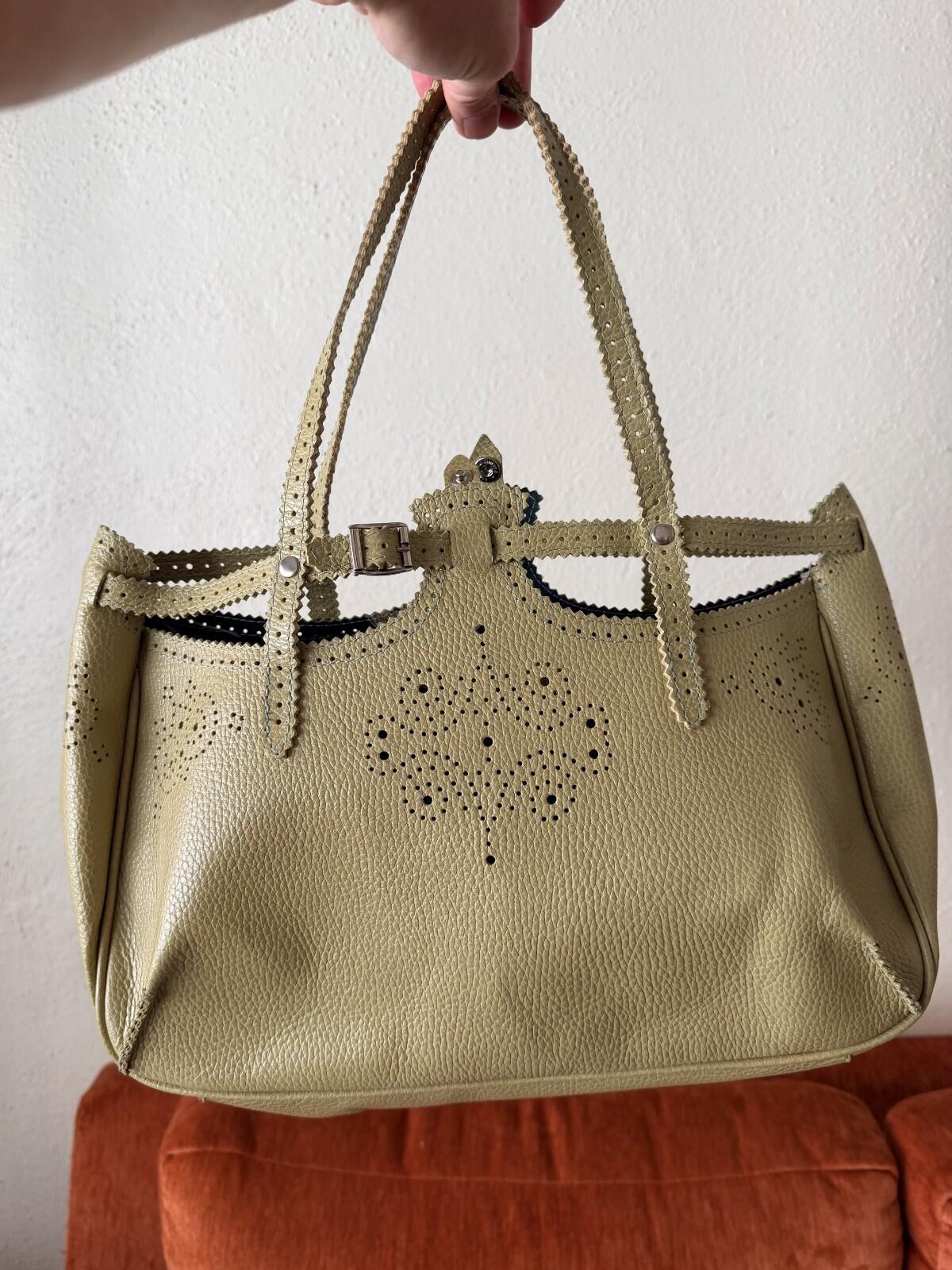 JAMIN PUECH DELICATE DETAIL HANDBAG showcasing lace perforated detail and vibrant chartreuse color.