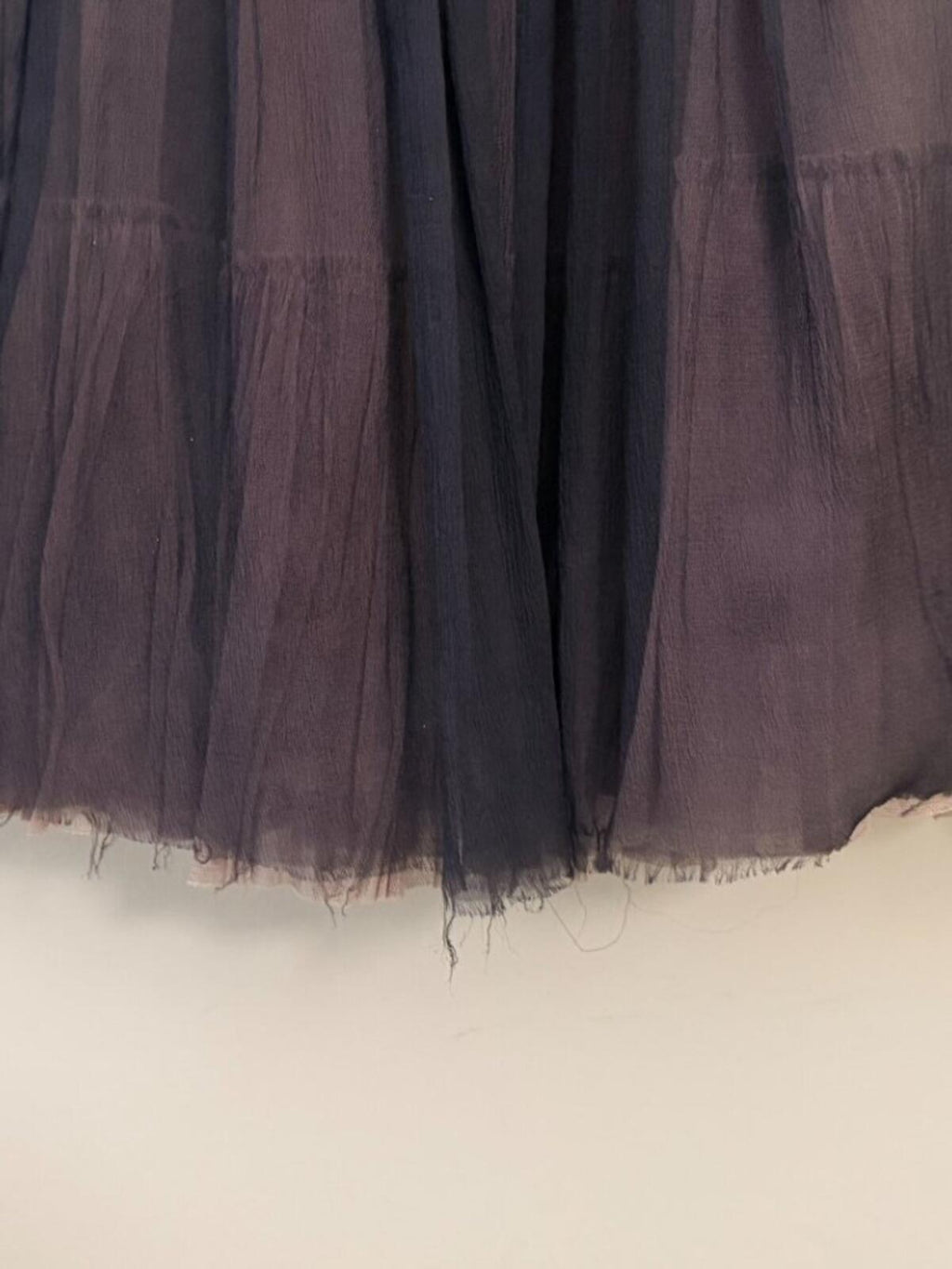 Detail of MARTIN GRANT FRENCH SILK RAW HEM LAYERED CIRCLE SKIRT S showcasing the sheer layers and raw hem.