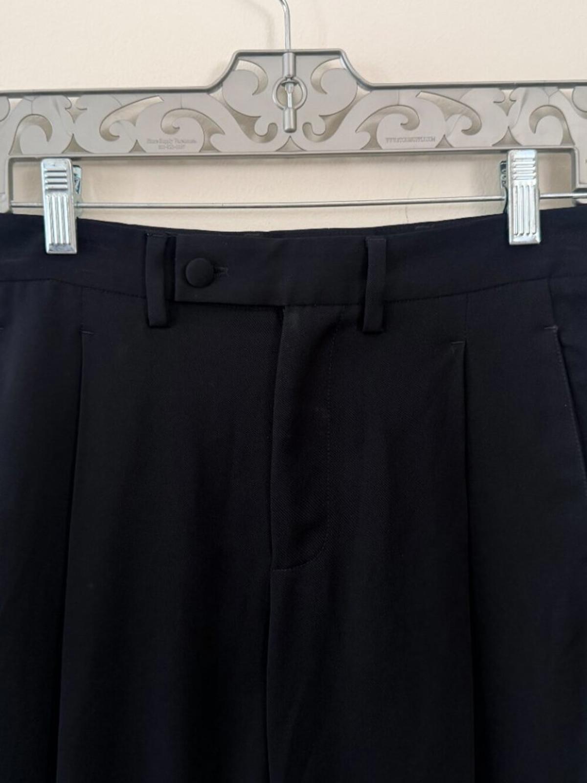 TOM FORD BLACK DRESS SPECIAL OCCASION PANTS waist detail with buttons and hangers.
