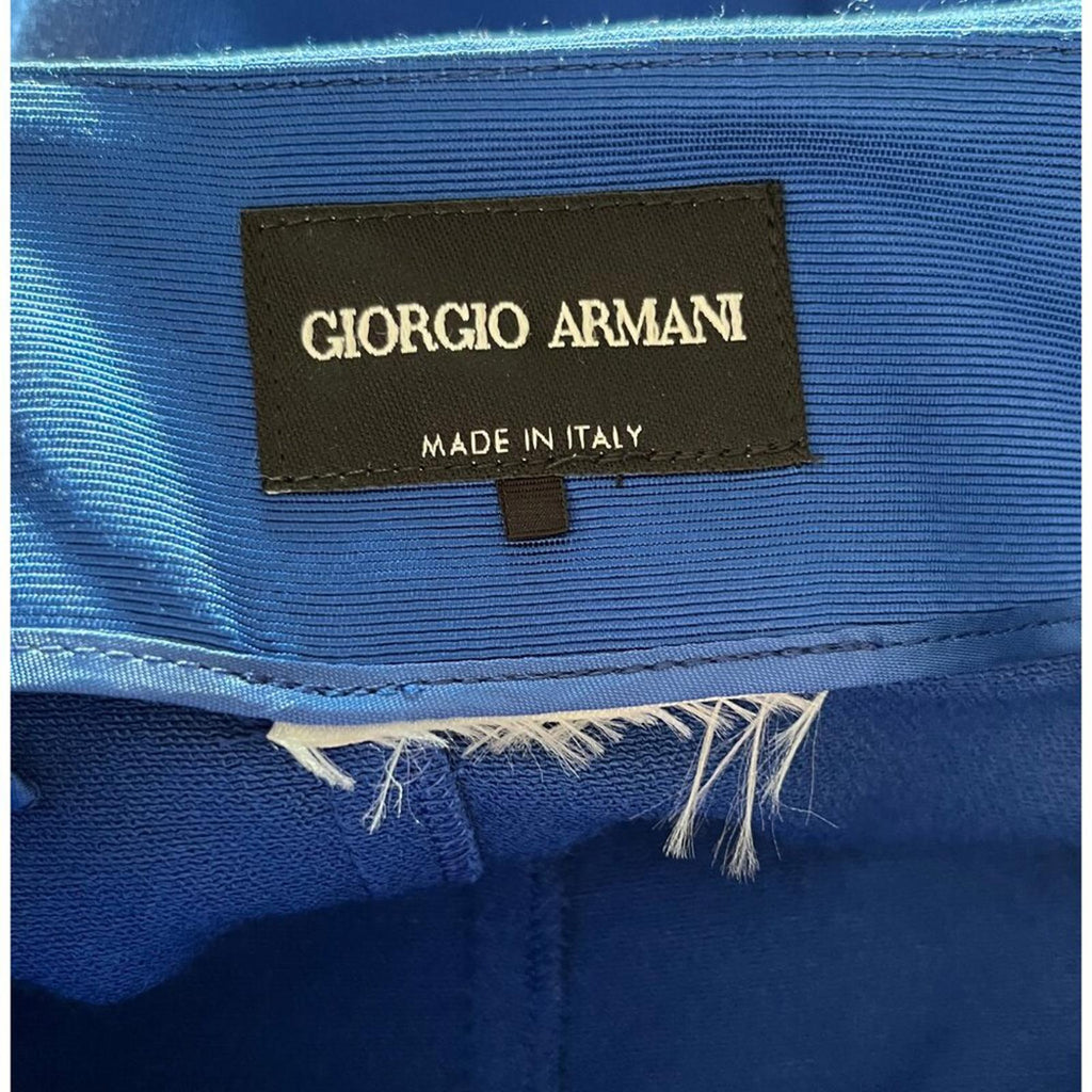 GIORGIO ARMANI BLACK LABEL BLUE LAYERED SKIRT label tag made in Italy on blue fabric.