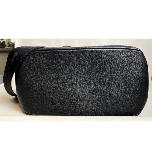Bottom view of the CHRISTIAN DIOR KIM JONES BLACK OBLIQUE MONOGRAM TOTE BAG showcasing its smooth texture.