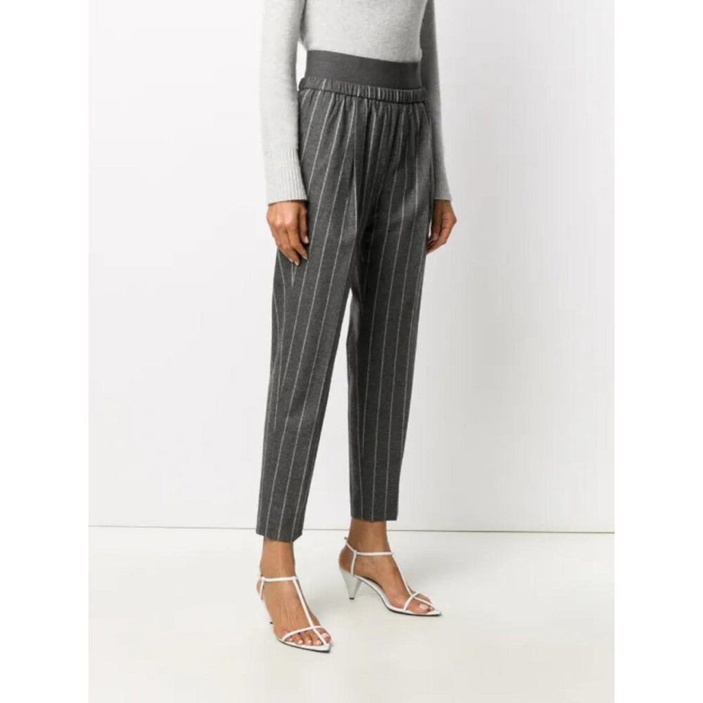 FABIANA FILIPPI CROPPED PINSTRIPE ELASTIC WAIST PANTS worn with a grey sweater and strappy heels, showcasing elegant style.