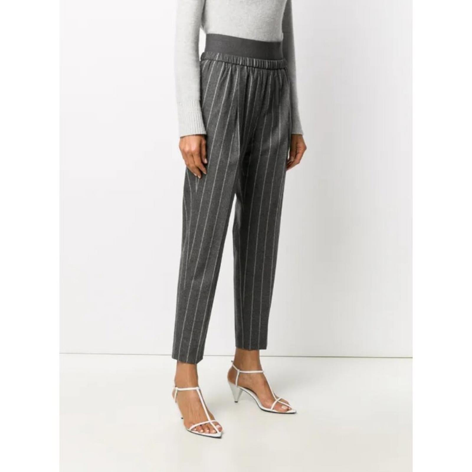 FABIANA FILIPPI CROPPED PINSTRIPE ELASTIC WAIST PANTS worn with a grey sweater and strappy heels, showcasing elegant style.