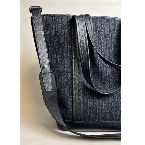 CHRISTIAN DIOR KIM JONES BLACK OBLIQUE MONOGRAM TOTE BAG showcasing its elegant design and quality materials.