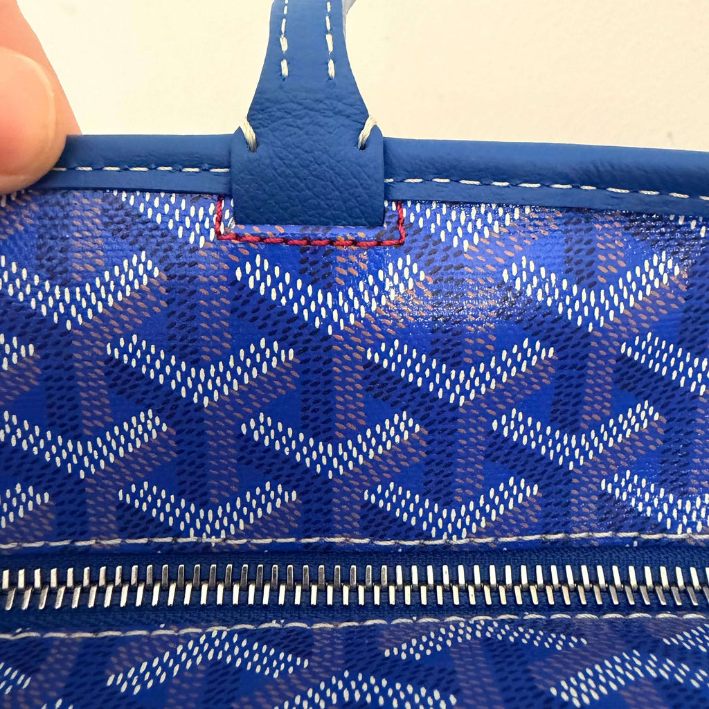 Interior detail of the Goyard Artois MM Tote Bag- Goyardine showcasing blue patterned lining and zipper.