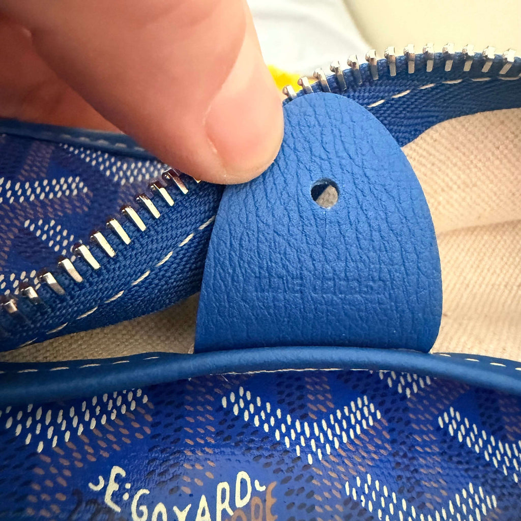 Close-up of the zipper detailing on Goyard Artois MM Tote Bag- Goyardine in blue leather.