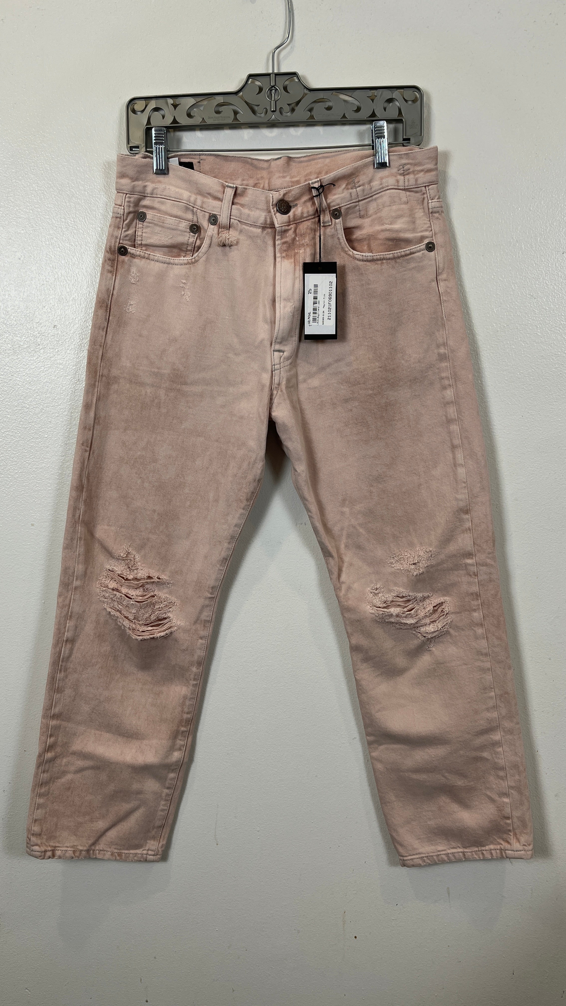 R13 PEYTON DIRTY PINK BOYFRIEND CROPPED JEAN displayed on a hanger, featuring distressed details and tag still attached.