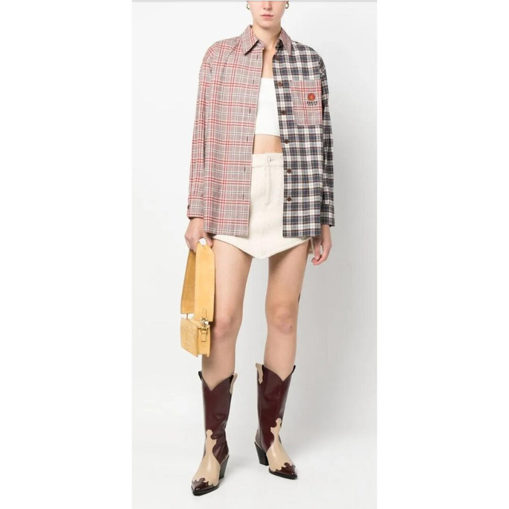 KENZO PARIS X NIGO 2 TONE PLAID OVERSIZED SHIRT worn with a white crop top and cream skirt, modeled with stylish boots.