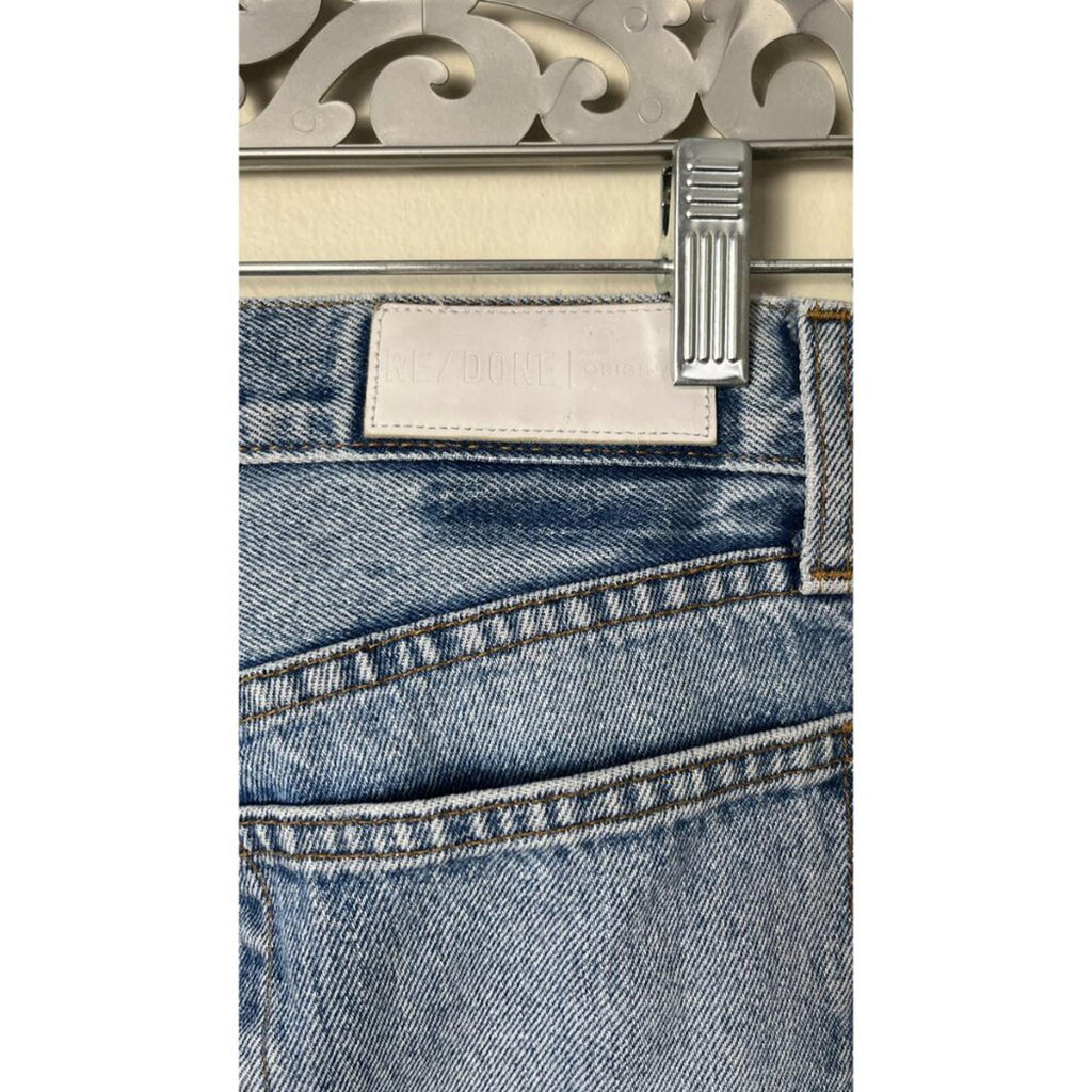 REDONE LEVIS VINTAGE DENIM JEANS close-up of the back pocket and label on cropped jeans.