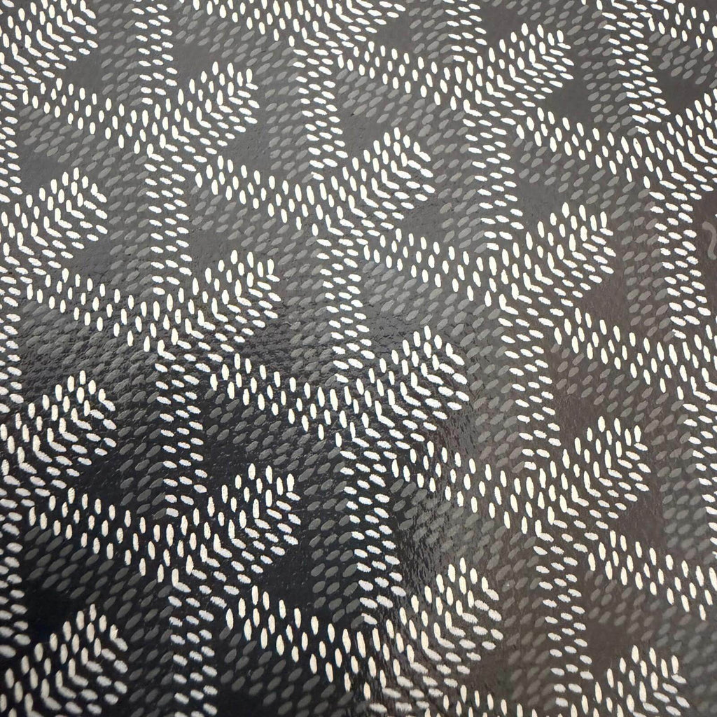 Goyard St. Louis bag GM- Goyardine pattern close-up featuring iconic design in black and white.