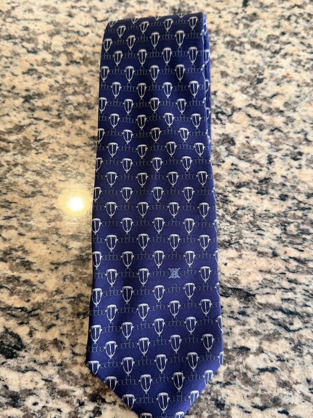 CELINE GEOMETRIC LOGO PRINT NECK TIE featuring a unique geometric pattern on a blue background.