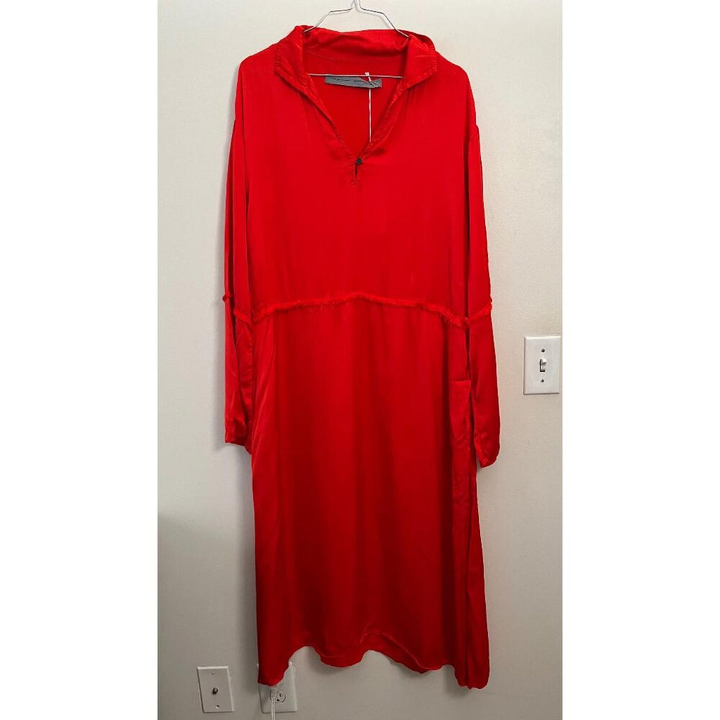 RAQUEL ALLEGRA RED GHOST RANCH MATTE RAYON SATIN DRESS hanging on display, showcasing its oversized fit and vibrant color.