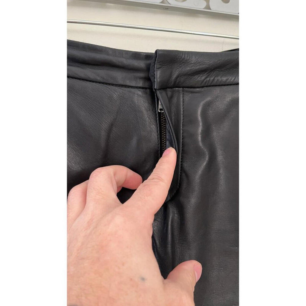 Close-up of MAJE LAMBSKIN LEATHER BIKER SHORTS zipper details, showcasing quality craftsmanship.