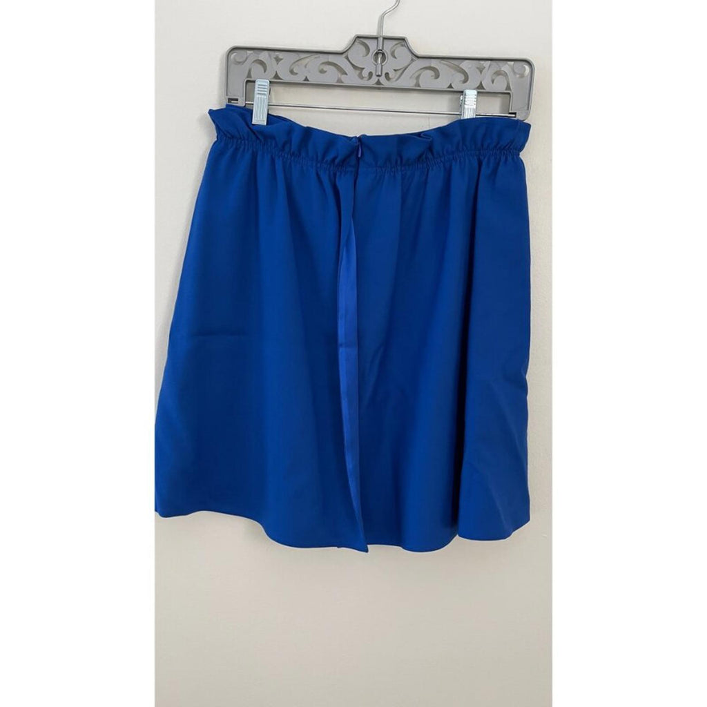GIORGIO ARMANI BLACK LABEL BLUE LAYERED SKIRT hanging on a decorative hanger against a light background.